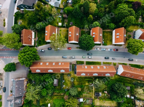 Preview: Scenic landscape from above aerial view of houses in small town in countryside Germany .
