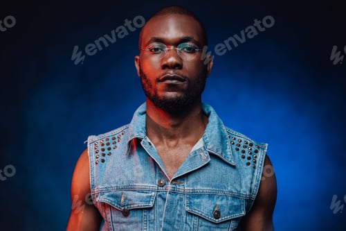 Preview: Sexy black man in urban clothes with eyeglasses