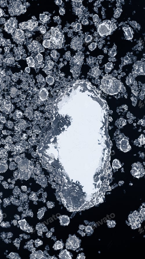 Preview: Aerial view on winter nature. Floes on river in winter.