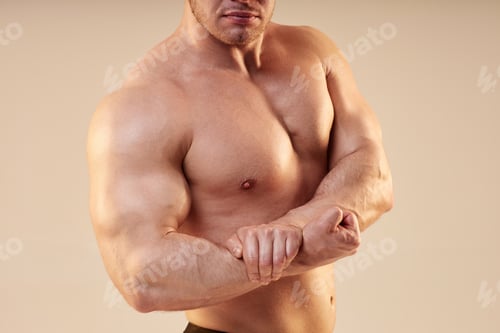 Preview: Male Bodybuilder Topless Showing Off Arm Muscles