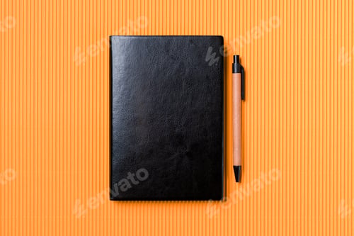Preview: Leather notebook cover on a orange background