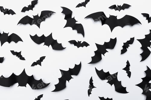Preview: halloween and decoration concept - paper bats flying