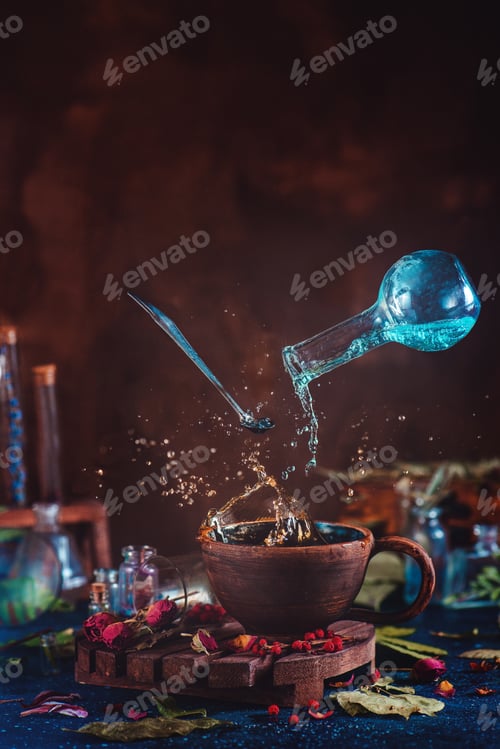 Preview: Flying potion bottle with pouring liquid in a magical still life. Brewing magical tea.