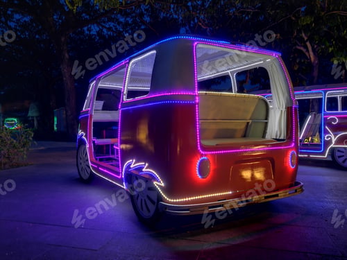 Vista previa: neon lights on the old van converted into display at night