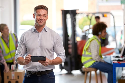 Preview: Male Manager In Logistics Distribution Warehouse Using Digital Tablet
