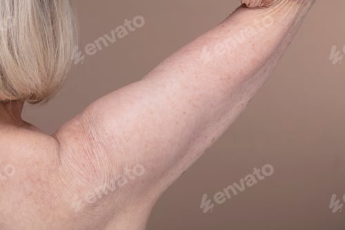 Preview: Close-up of senior woman's bare shoulder