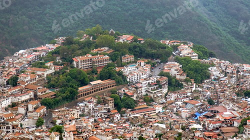 Preview: Beautiful view of the hillside town of Taxco de Alarcon in Mexico during a cloudy day