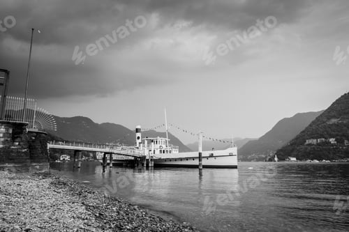 Preview: boat docked at the lake waiting for passengers