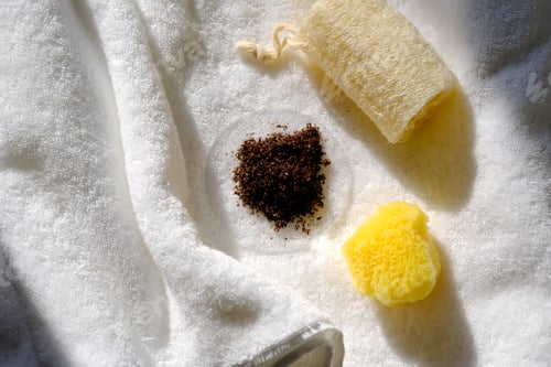 Preview: Coffee scrub with two washcloths and a towel.