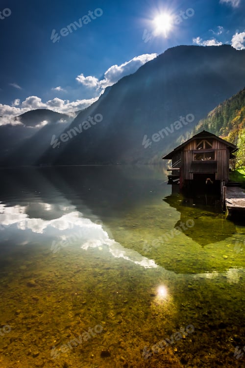 Preview: Old wooden haven at mountain lake
