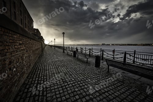 Preview: Breathtaking shot of the sidewalk near the sea in Liverpool on a cloudy day