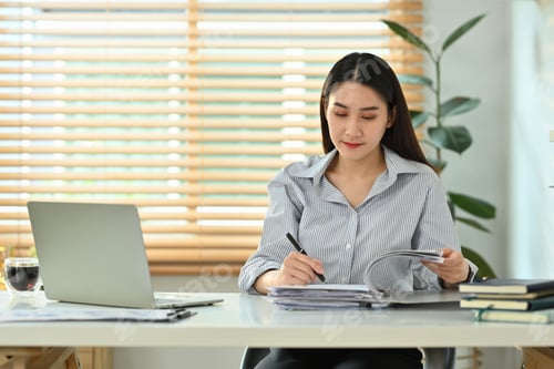 Preview: Focused female worker analyzing sales statistics document, signing contracts at her working desk.