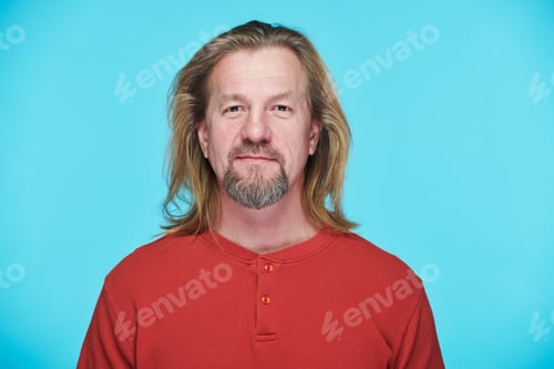 Preview: Portrait of mature man with long hair