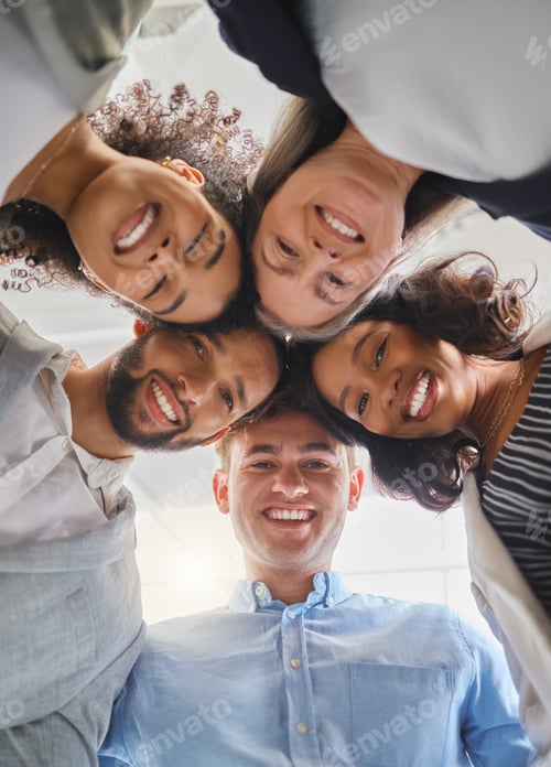 Preview: Group of joyful diverse businesspeople huddling together in support and unity together at work. Hap