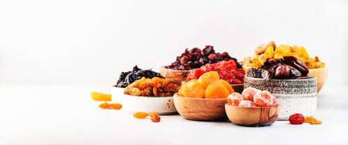 Preview: Healthy food snacks: natural dried fruits mix in bowls on white background