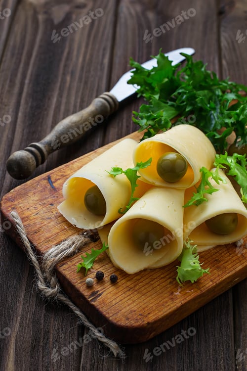 Preview: Sliced cheese and green olives
