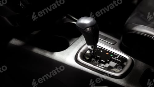 Preview: Car gear. Close up of modern car automatic gear selector or electronic shifter.