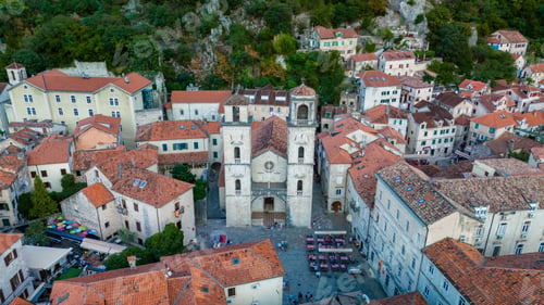 Preview: Aerial view of the charming old town of Kotor with red rooftops and historic architecture