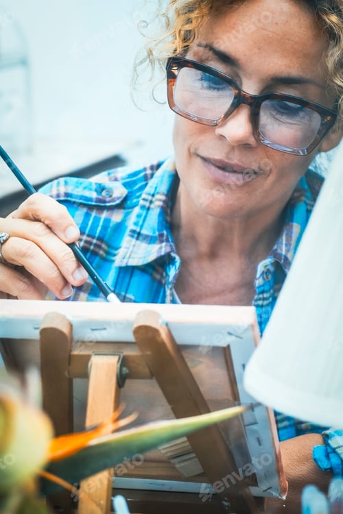 Preview: Concept of art, creativity, hobbies, work and creative occupation. Front view of blond