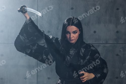 Preview: Woman in kimono practicing martial arts with katana