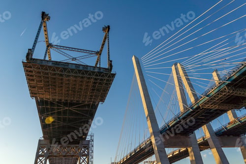 Preview: Low angle of a bridge in New York, USA at sunset