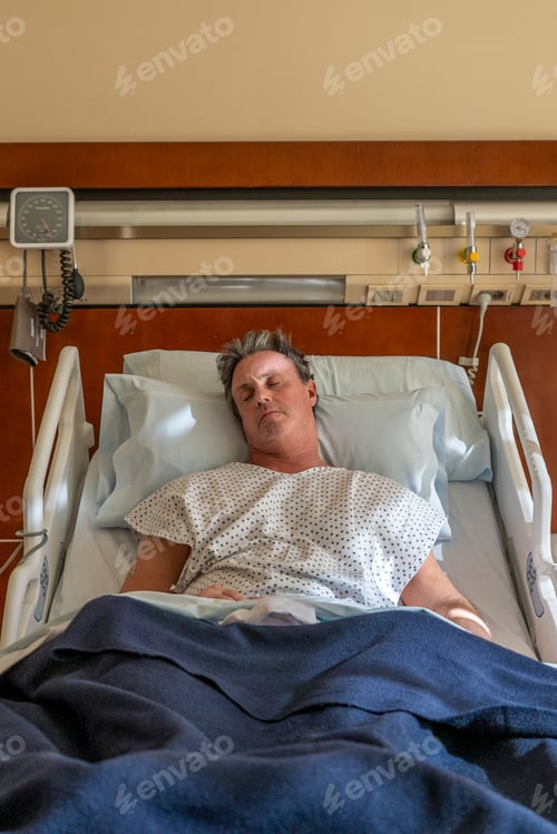 Preview: Man in hospital gown deep in sleep