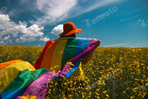 Preview: Young woman with LGBT flag.