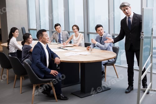Preview: Business people having meeting in board room