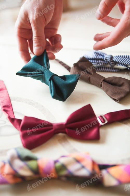 Preview: The Male Hand Choosing Hand Made Bow Ties