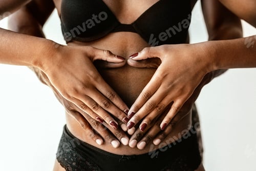 Preview: Black couple touching the baby bump