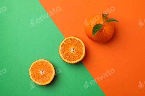 Vista previa: Ripe mandarins on two tone background, top view