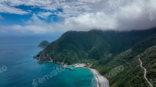 Preview: Stunning aerial view of Taiwan coastline showcasing mountains and clear blue waters