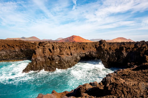 Preview: Rocky coast with wavy ocean on Lanzarote island