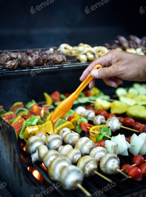 Preview: Bbq healthy kebabs with vegetables and meat. Delicious food prepared outdoors