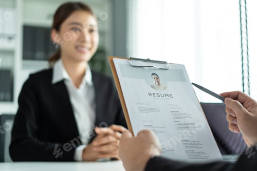 Preview: Close up of woman give resume to hr manager for job interview in office.