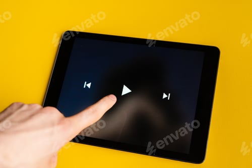 Preview: close up play button interface on a modern gadget when watching videos