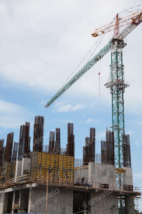 Preview: View of construction site with modern tower crane