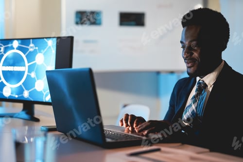 Preview: African man trader working inside hedge fund office - Focus on face