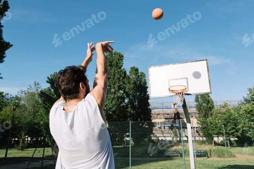 Preview: Man playing basketball