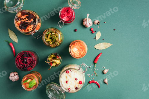 Preview: Probiotics food background. Korean carrot, kimchi, beetroot, sauerkraut, pickled cucumbers in glass