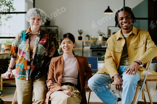 Preview: Cheerful Gen Z Colleagues Posing For Portrait