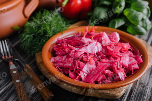 Preview: Salad with cabbage and beetroot on wooden table