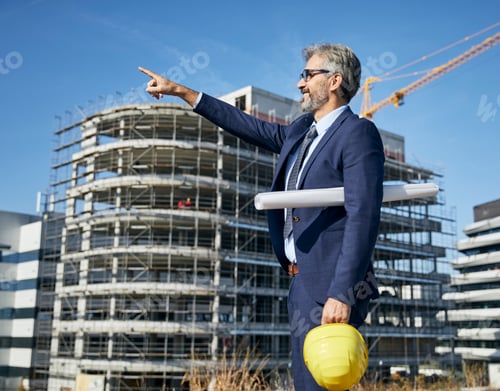 Preview: senior businessman architect helmet construction site building architecture tablet