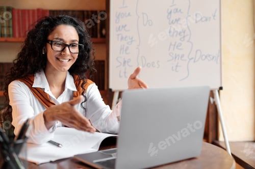 Preview: English teacher having video conference chat with students
