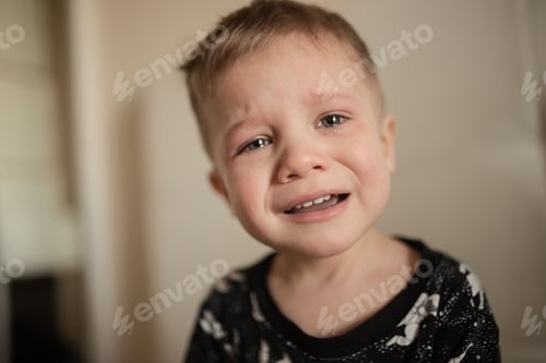 Preview: portrait of crying cute little caucasian boy