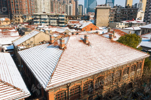 Preview: Aerial shot of buildings covered in snow in Wuhan, China.