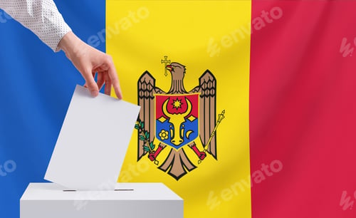 Preview: Elections, Moldova. A hand throws a ballot into the ballot box.The concept of presidential elections