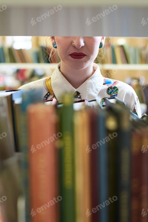 Preview: Female student in a public library, red lips