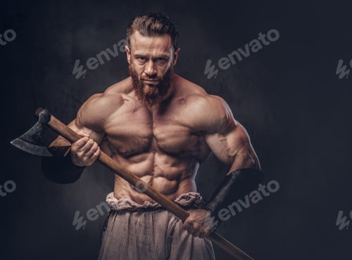 Preview: A man holds axe over dark grey background.