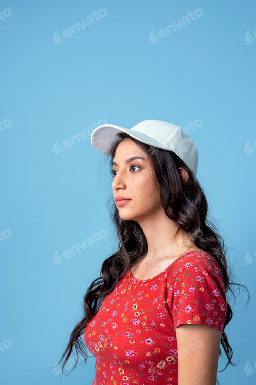 Preview: Woman wearing a white cap isolated on background